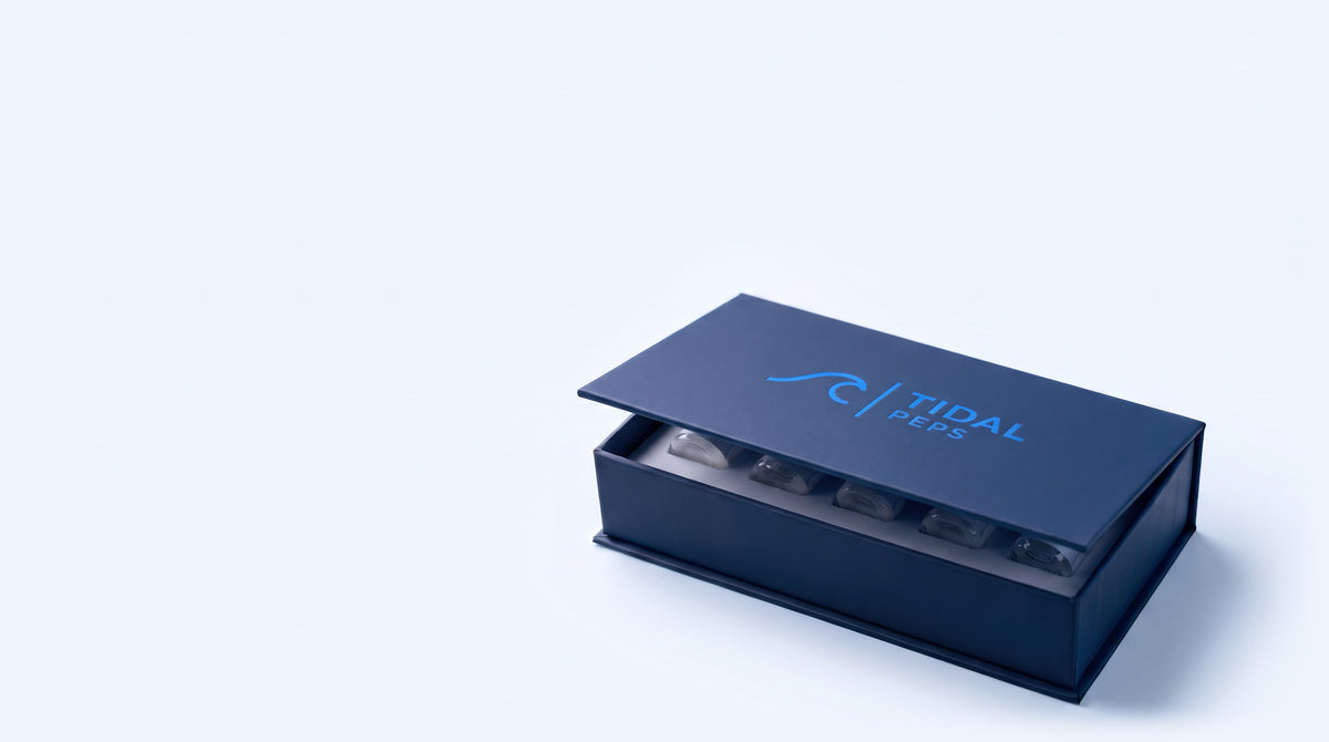 Tidal Peps presentation box opening to show five research peptide vials